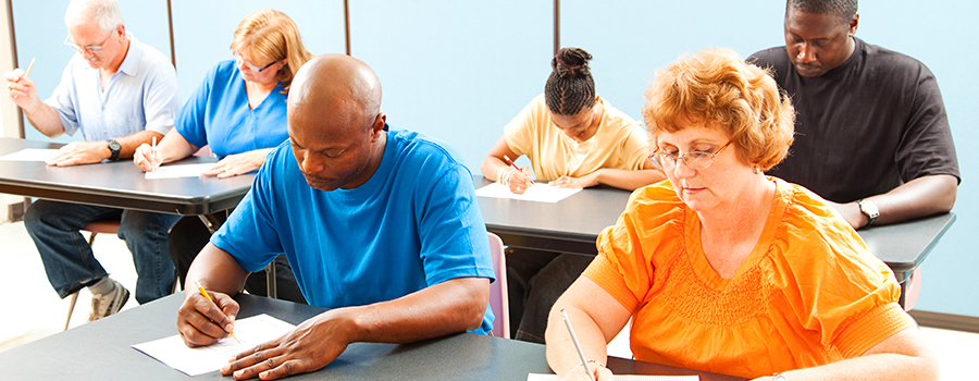 Prior to registering, students taking a test.