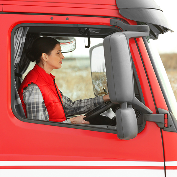 Driver transporting retail material to distribution centers